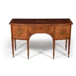 A George III mahogany and inlaid bowfront sideboard