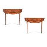 A pair of satinwood and marquetry inlaid console tables