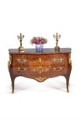 A Louis XV tulipwood, specimen marquetry and parquetry serpentine commode, stamped * A LAPIE