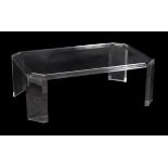 A modern perspex coffee table