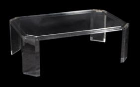 A modern perspex coffee table