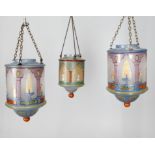 A set of three hand painted glass lanterns in the Ottoman style