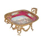 A French Sevres-style porcelain and gilt metal mounted twin handled comport