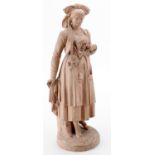 A French pink terracotta figure of a young woman