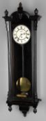 A late 19th century ebonised Vienna wall timepiece