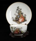 An 18th century Meissen porcelain cup and saucer