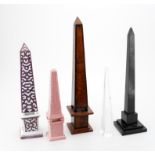 Five various desk obelisks including modern Thuya model