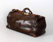 A large leather holdall of Gladstone Bag form