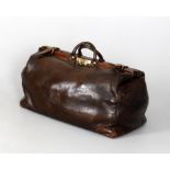 A large leather holdall of Gladstone Bag form