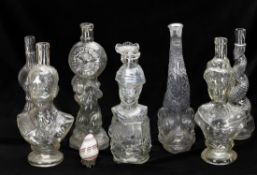 A collection of press moulded glass including All'Eroe Galliano 1897 figural bottle