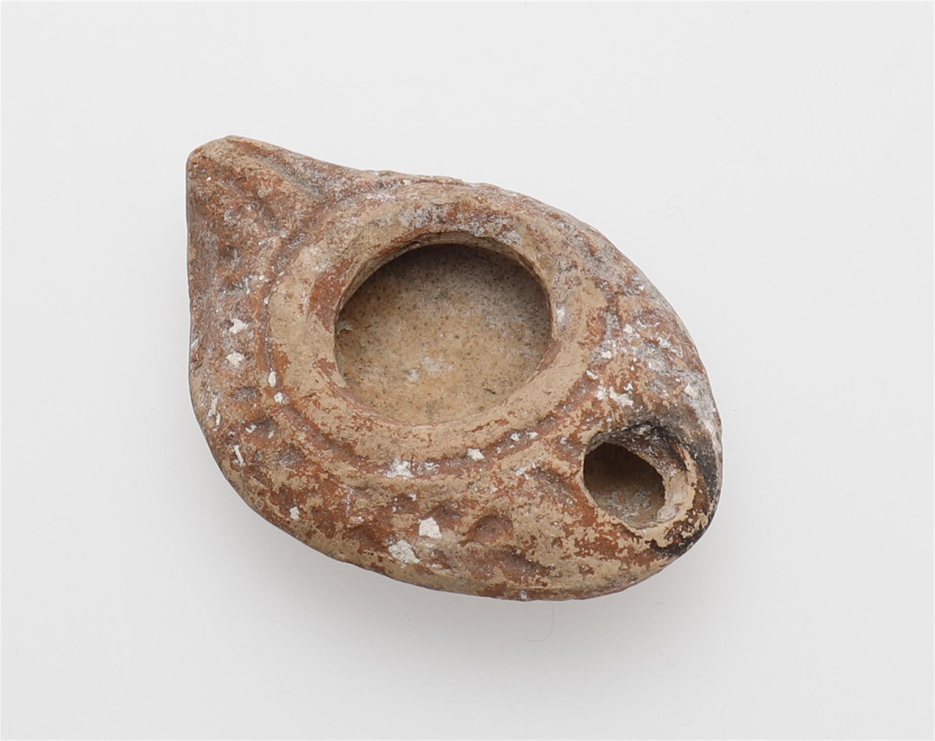 Assorted to include a Roman terracotta oil lamp - Image 8 of 11