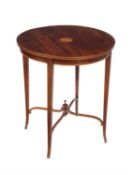 An Edwardian mahogany occasional table