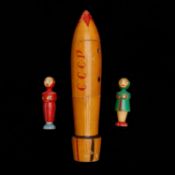 An early 1960s Soviet painted wooden space rocket matryoshka toy