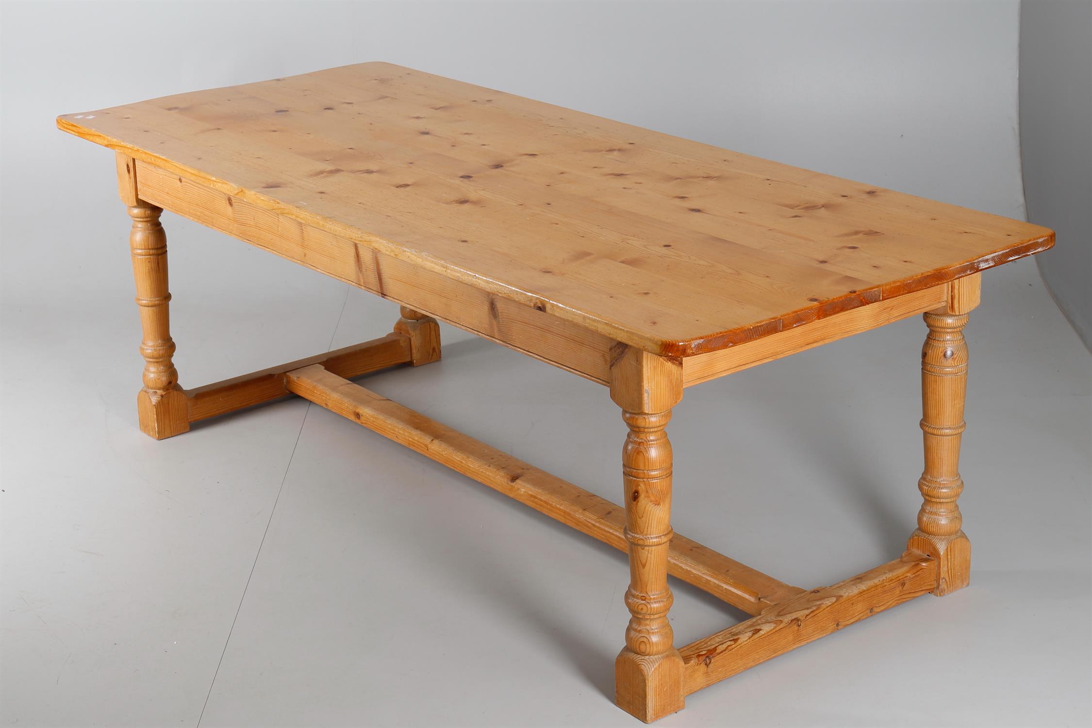 A contemporary pine refectory table in the late 17th century manner