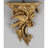 A carved giltwood wall bracket after a design by Chippendale