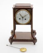 Y A late 19th century French rosewood and gilt metal mounted 8 day mantel clock