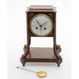 Y A late 19th century French rosewood and gilt metal mounted 8 day mantel clock