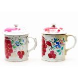 Two near pairs of Russian hand decorated porcelain mugs and covers