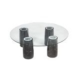 A glass and marble low centre table