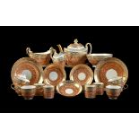 A Worcester (Flight & Barr) salmon-pink and gilt part tea service