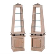 A pair of limed oak display cabinets