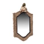 A shell clad wall mirror in the manner of 18th century giltwood examples
