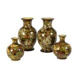 Two pairs of Doulton faience vases