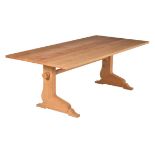 An oak refectory type dining table by Holgate and Pack