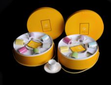 Two modern French porcelain boxed sets of six coffee cans and saucers for Christian Lacroix