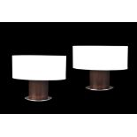 A pair of lacquered African walnut table lamps