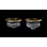 A pair of modern French moulded and clear cut glass and gilt metal mounted centre bowls