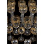 A Venetian clear-glass, engraved and gilt part table service