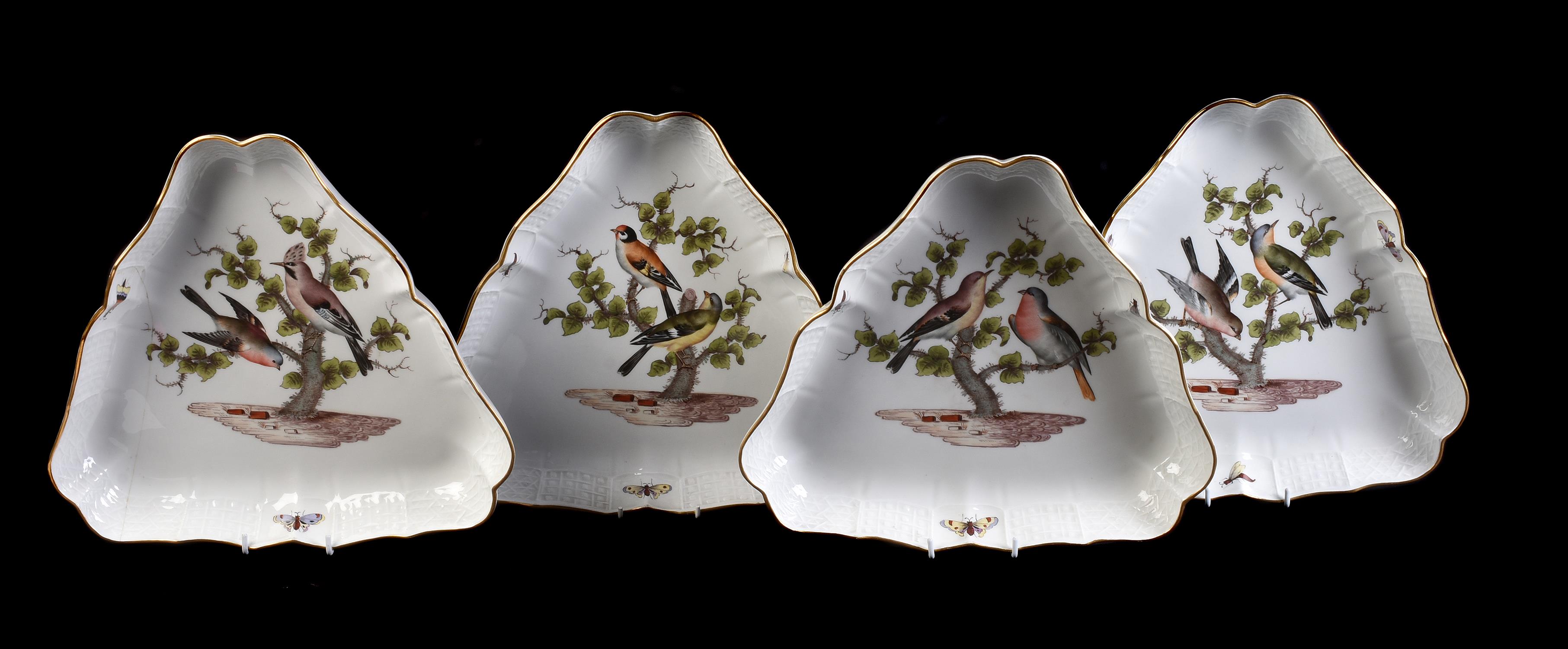 A set of four Meissen trefoil serving dishes painted with birds
