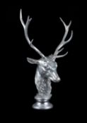 A silver coloured antler and composition model of a stag's head by Anthony Redmile