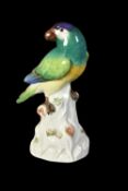 A Meissen model of a green parrot