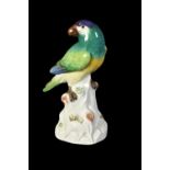 A Meissen model of a green parrot