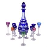 A Czechoslovakian clear cut-glass and blue-flashed spirit set