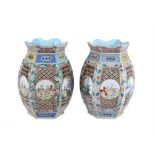 A pair of large famille rose 'mille-fleurs' lanterns