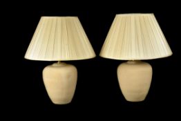 A pair of glazed ceramic table lamps