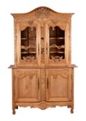 A French carved pine cabinet