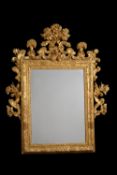 A giltwood wall mirror in George III style