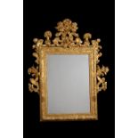 A giltwood wall mirror in George III style