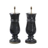 A pair of substantial black and white veined marble and gilt metal mounted table lamps