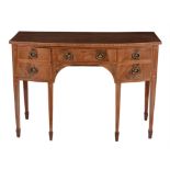 A George III mahogany and inlaid sideboard