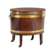 A George III mahogany and brass bound oval wine cooler