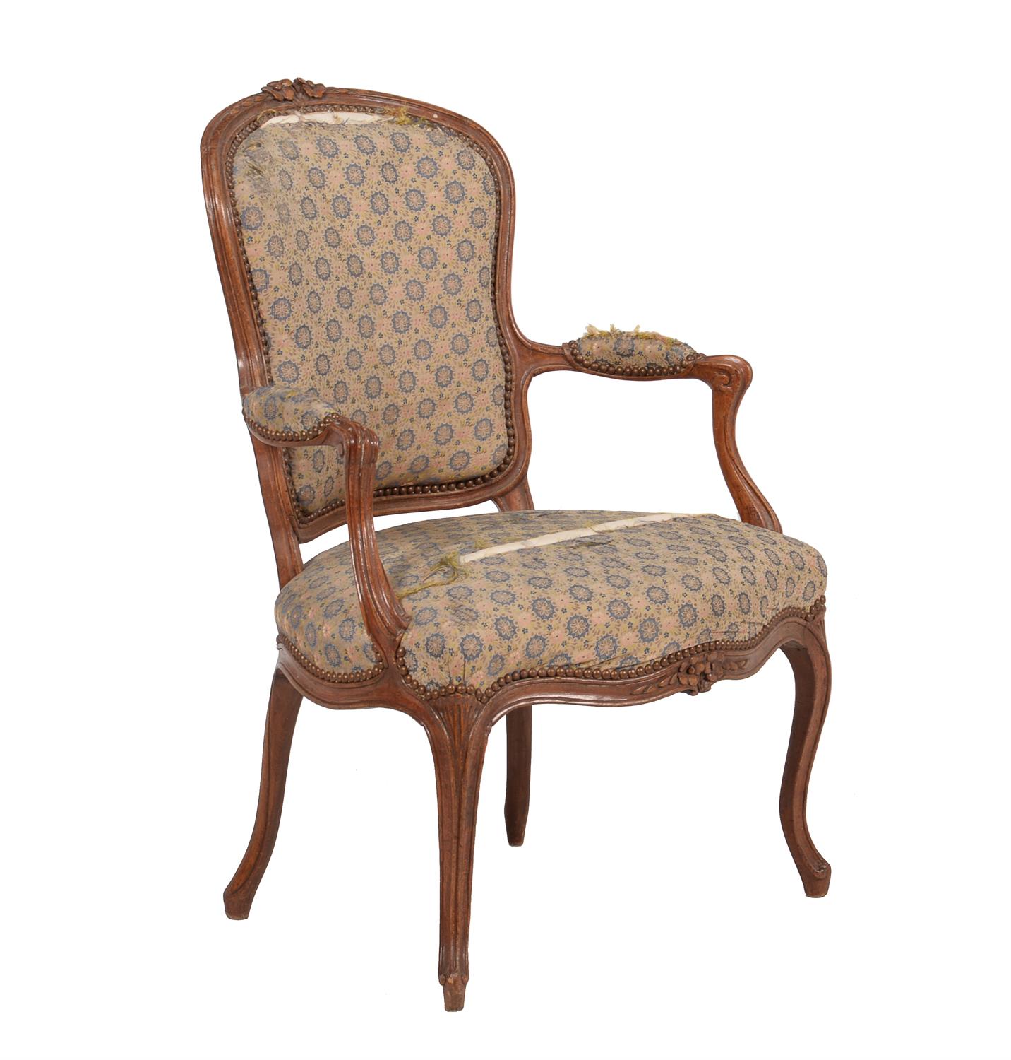 A French walnut and upholstered armchair in Louis XV style