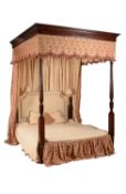 A mahogany and inlayed four post bed in George III style