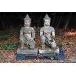 A pair of stone composition garden models of Guanyin