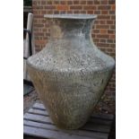 A substantial red stoneware garden urn