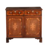 A George III mahogany and inlaid side cabinet